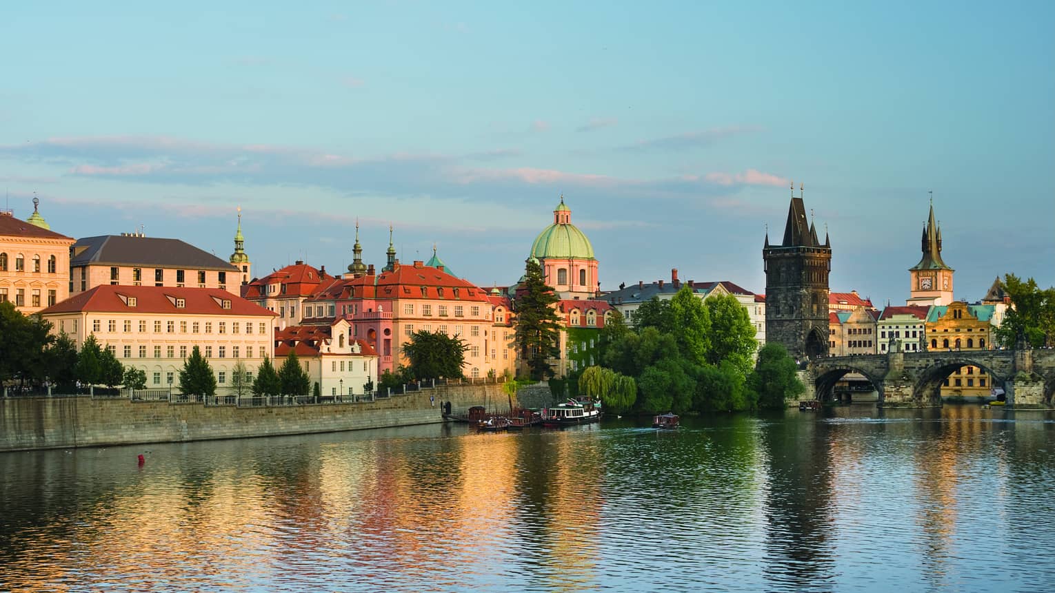 View across water to historic buildings on Prague waterfront