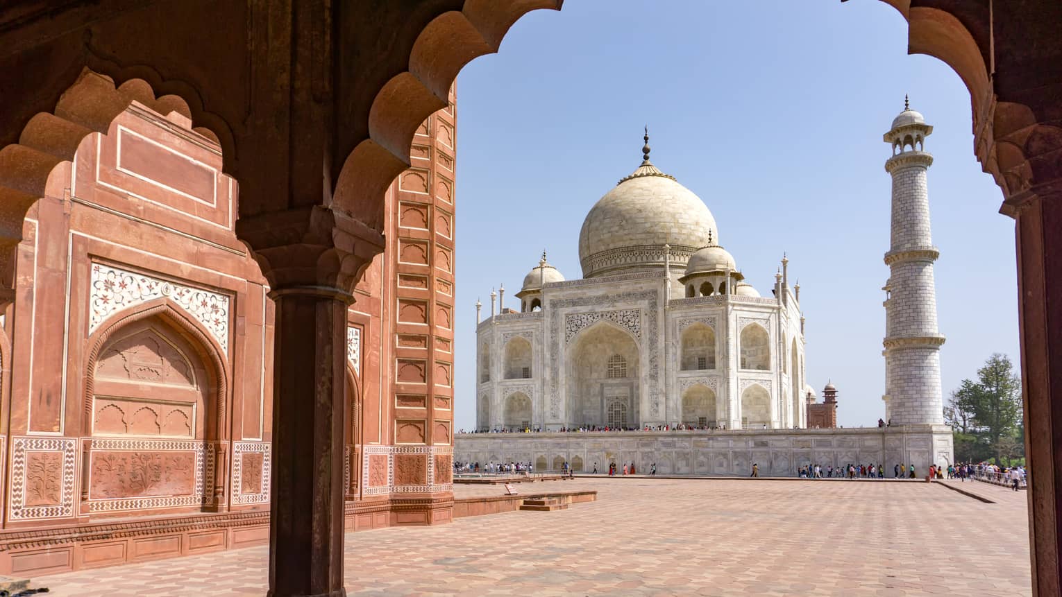 Taj Mahal through the view of a nearby corridor