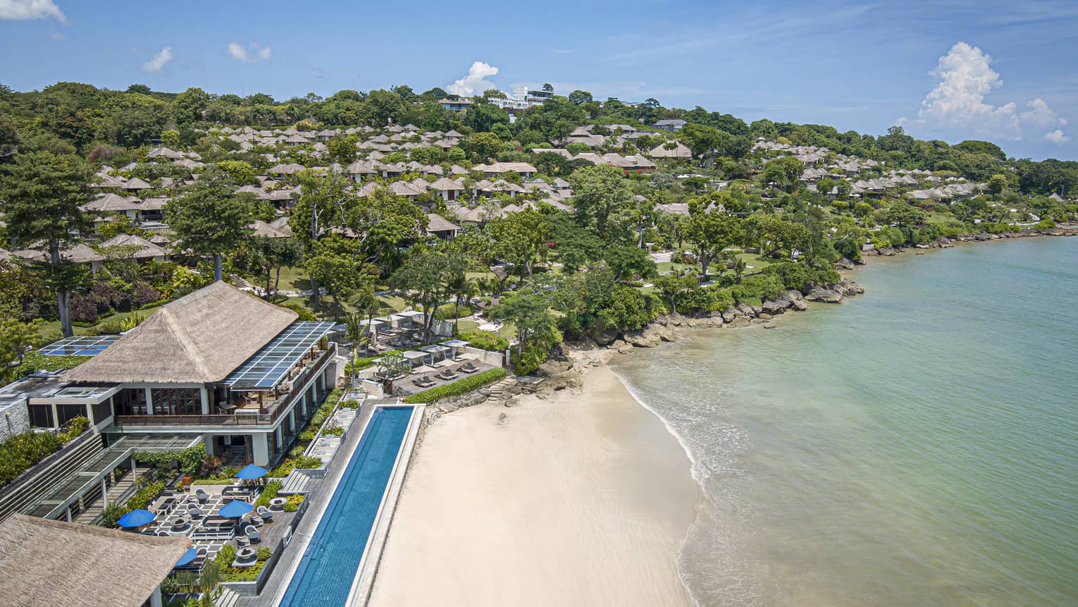 Aerial shot of the Resort, visible shoreline and foliage