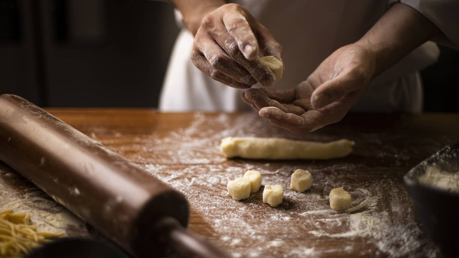 Chef cuts homemade gnocchi