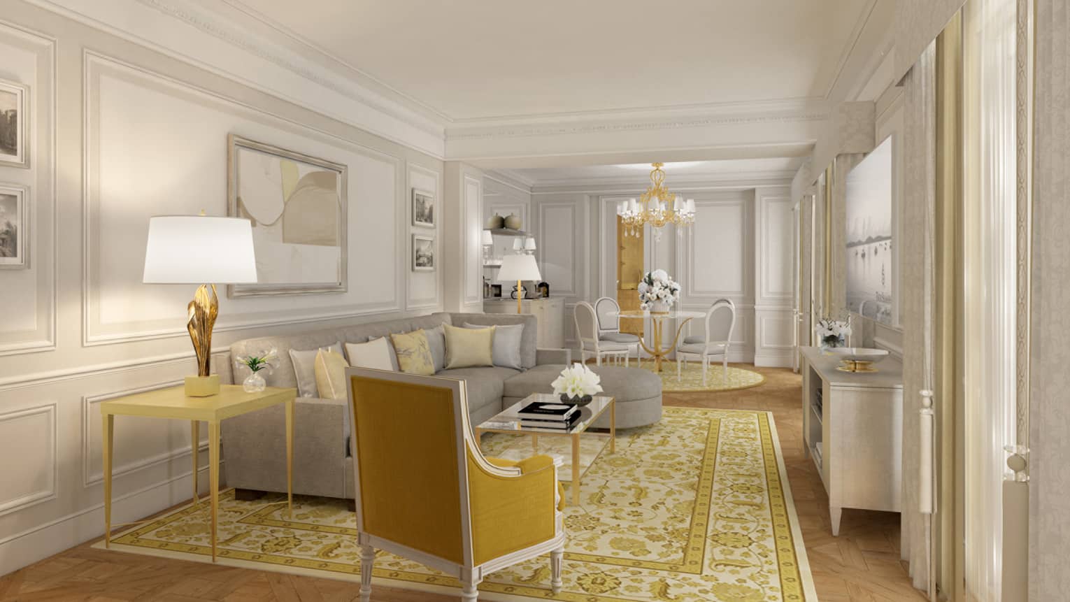 Hotel suite living room with crown molding, grey sofa and yellow ornate rug