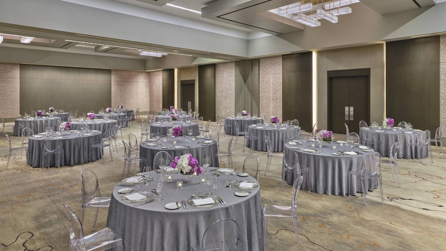 Ballroom with round tables set for an event