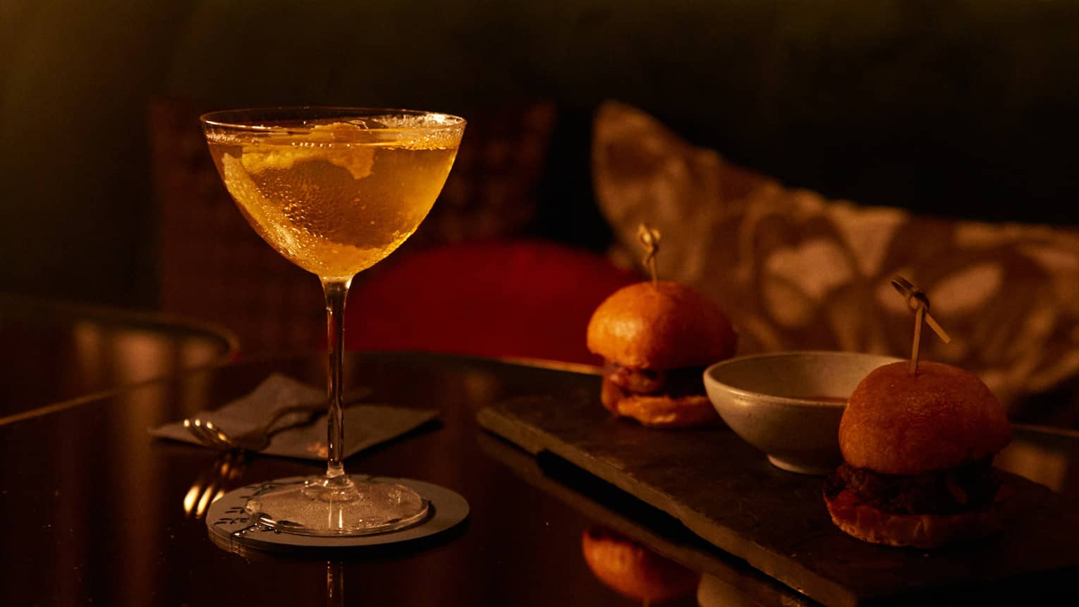 An amber coloured cocktail.