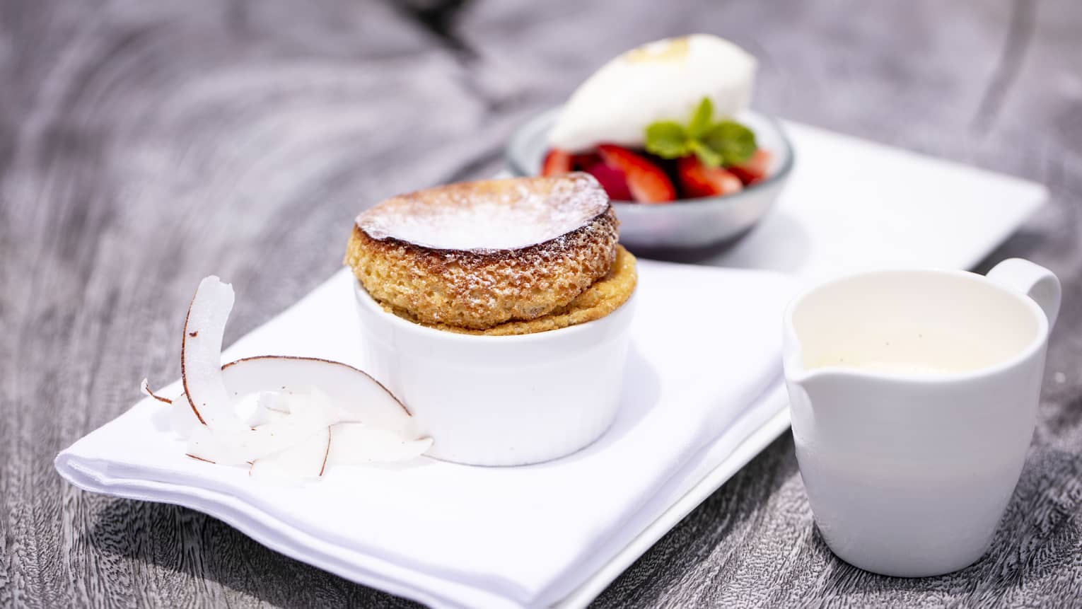 French toast and fresh fruit with coconut garnish