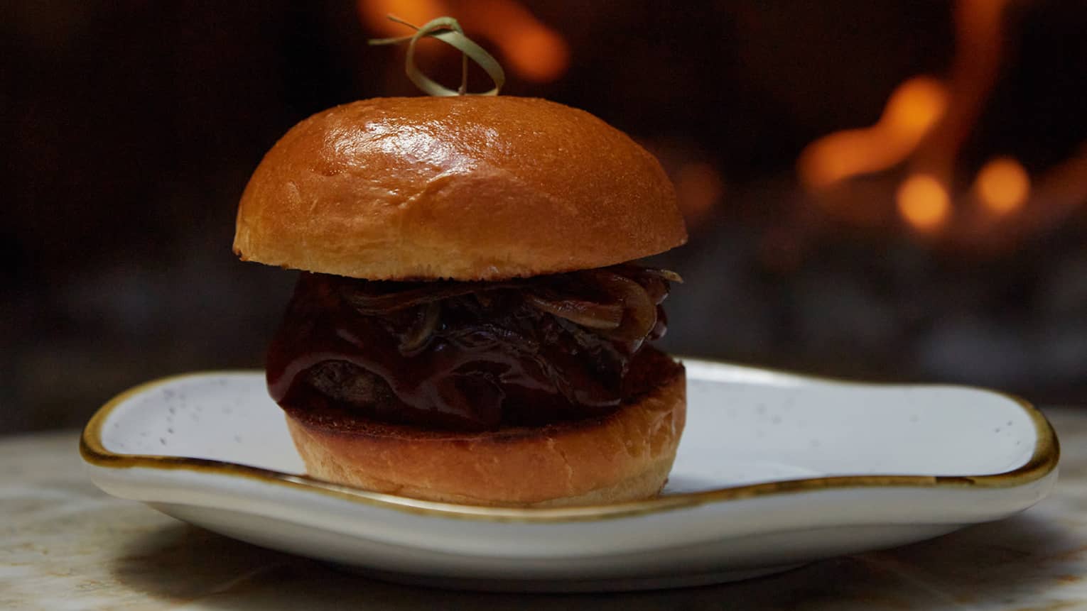 A sandwhich on a plate.