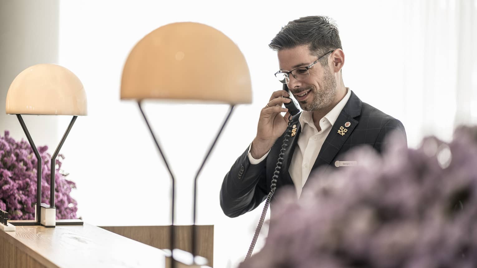 The concierge happily assists guests over the phone 