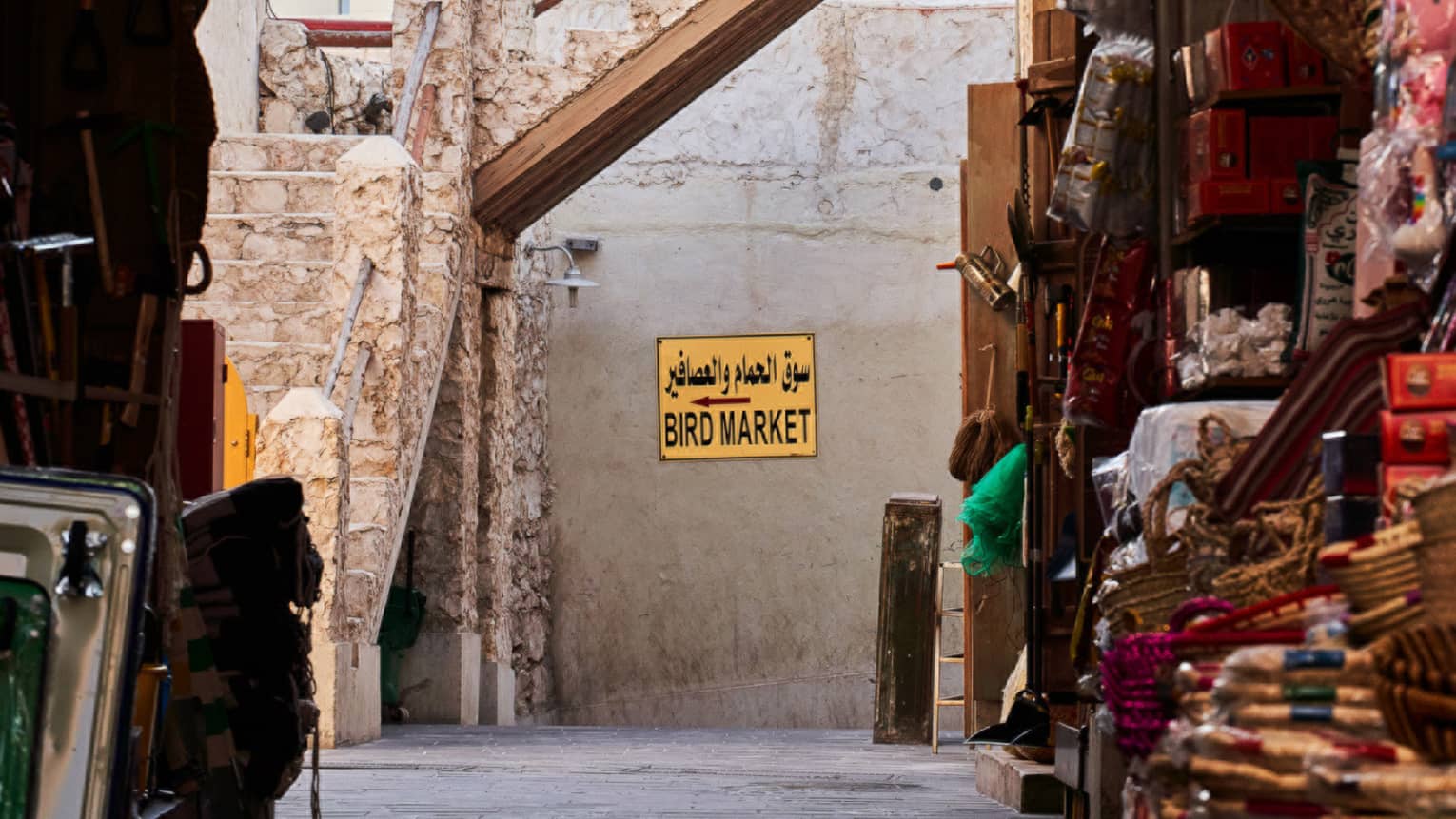 Market place alley way opens up to a tall spiral building