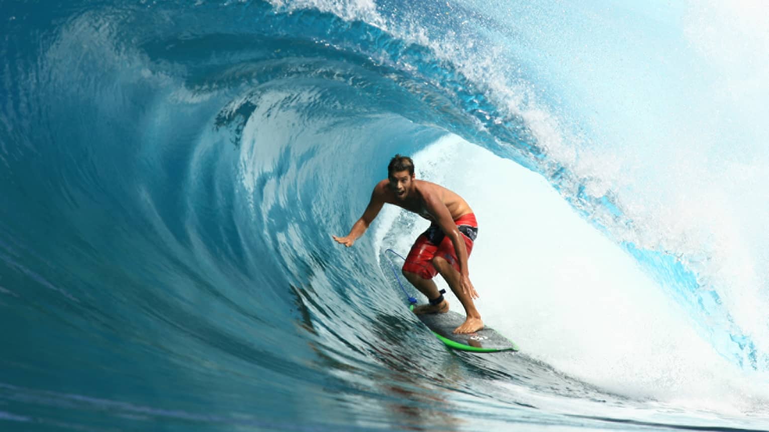 World Champion surfer David Rastovich rides a wave