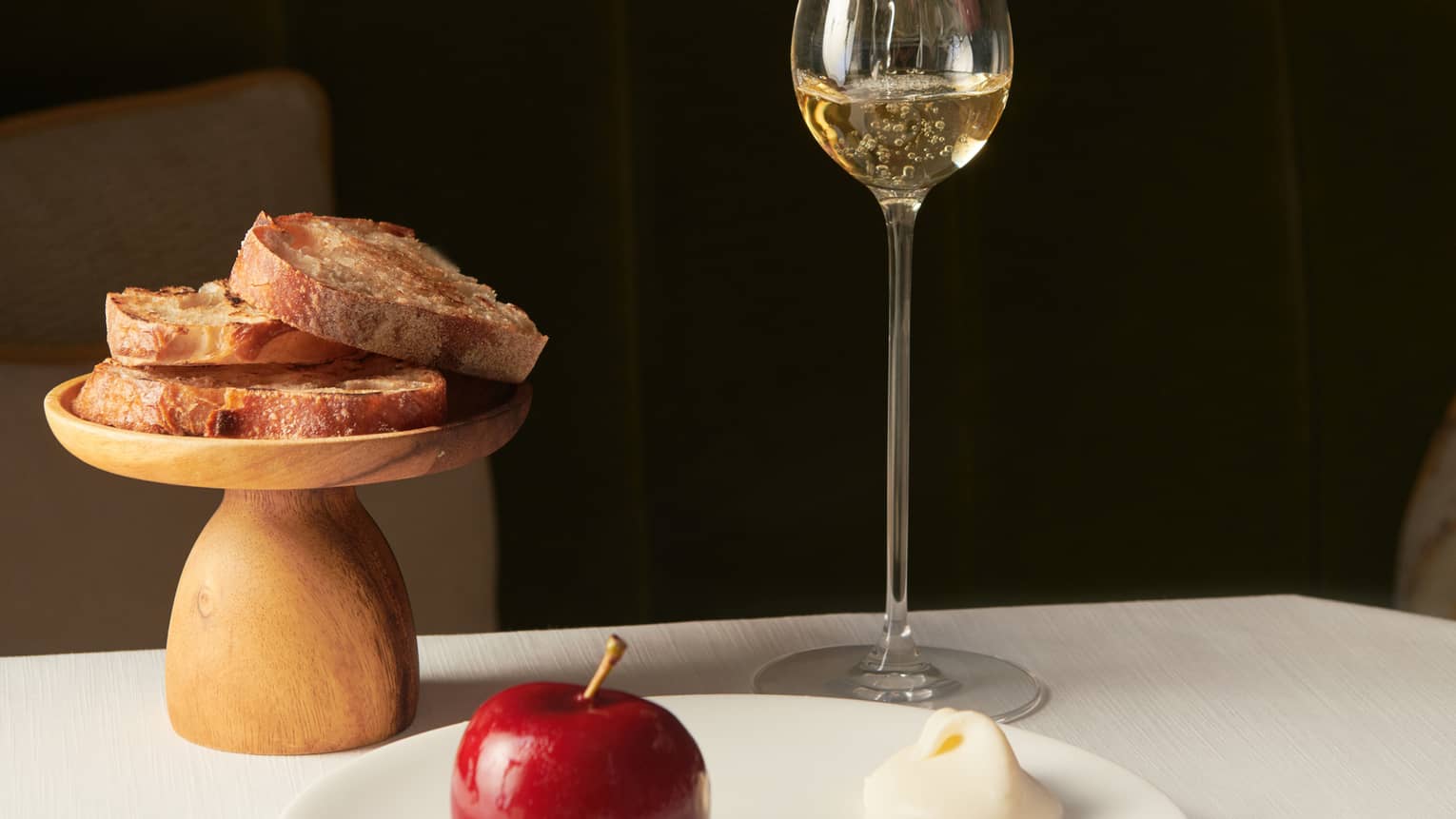 Glass of white wine and accompanying food