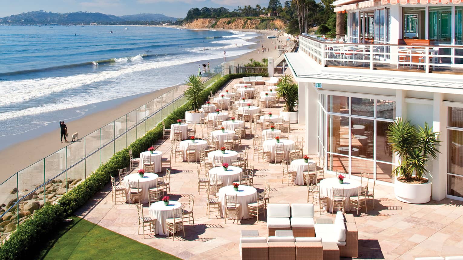 View over sunny La Pacifica Terrace by beach, ocean