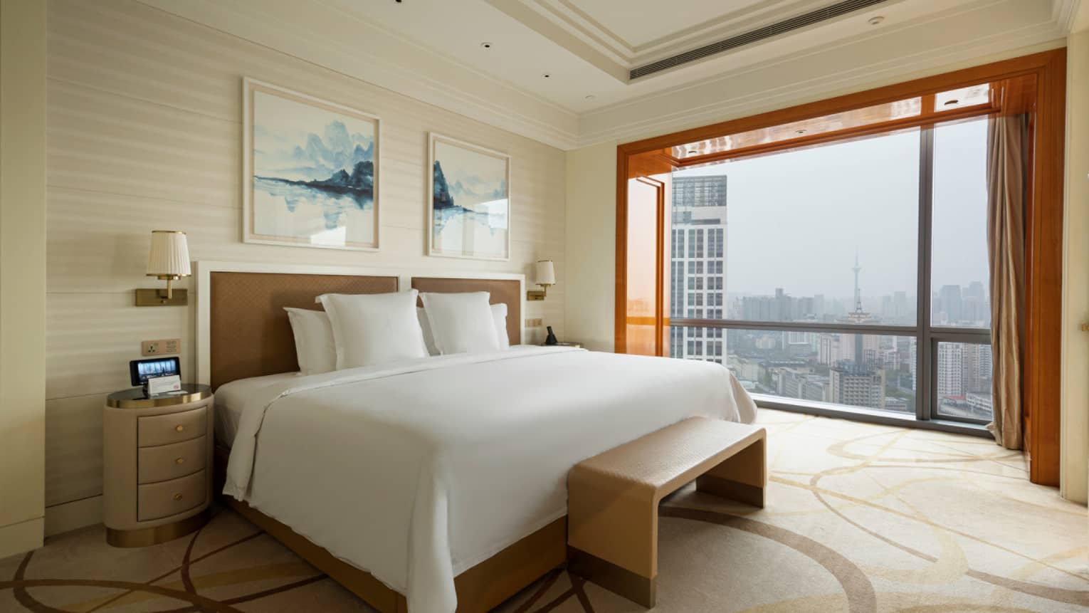 Hotel room with queen bed