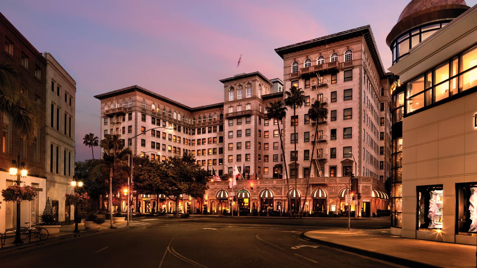 Beverly Wilshire, A Four Seasons Hotel building exterior, entrance at sunset
