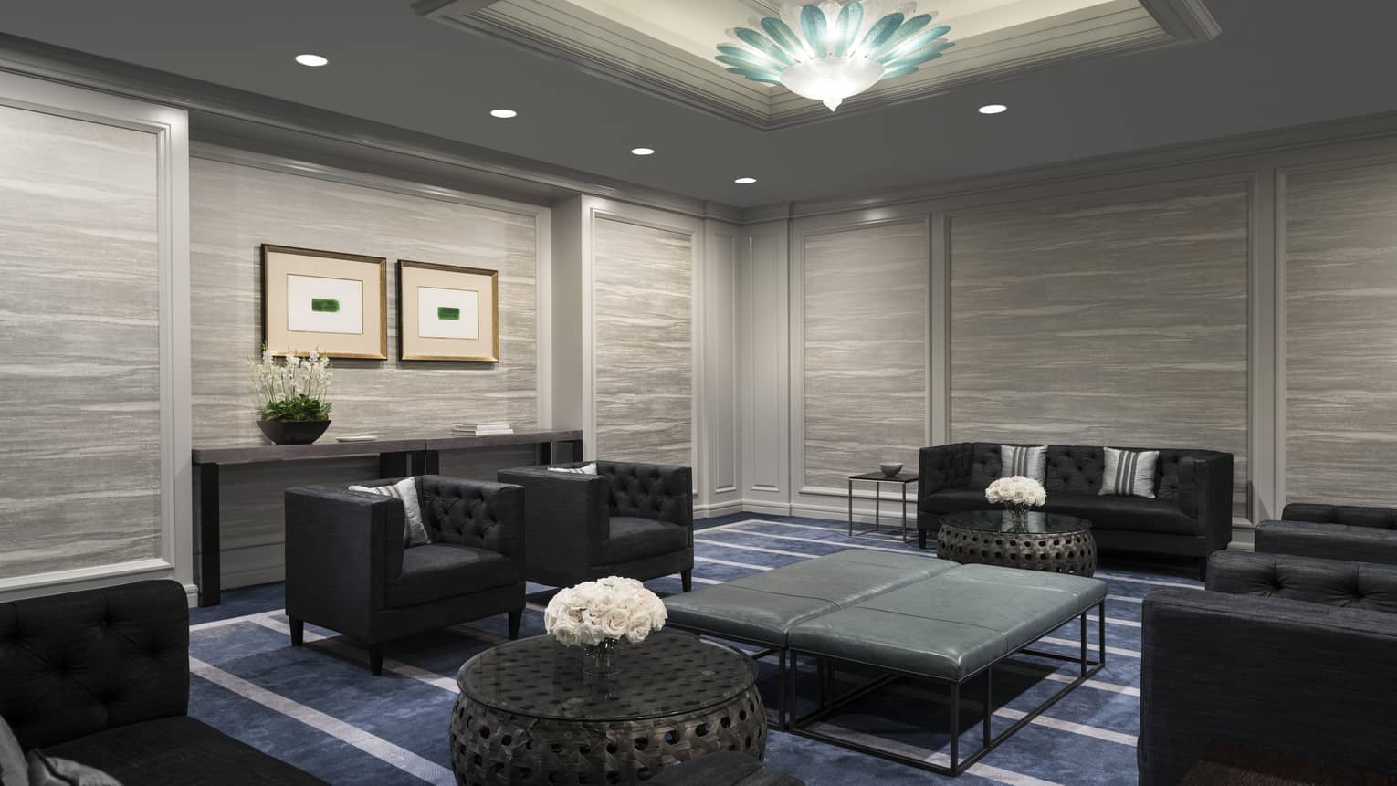 Stinson Room event lounge with black sofas and armchairs, leather bench
