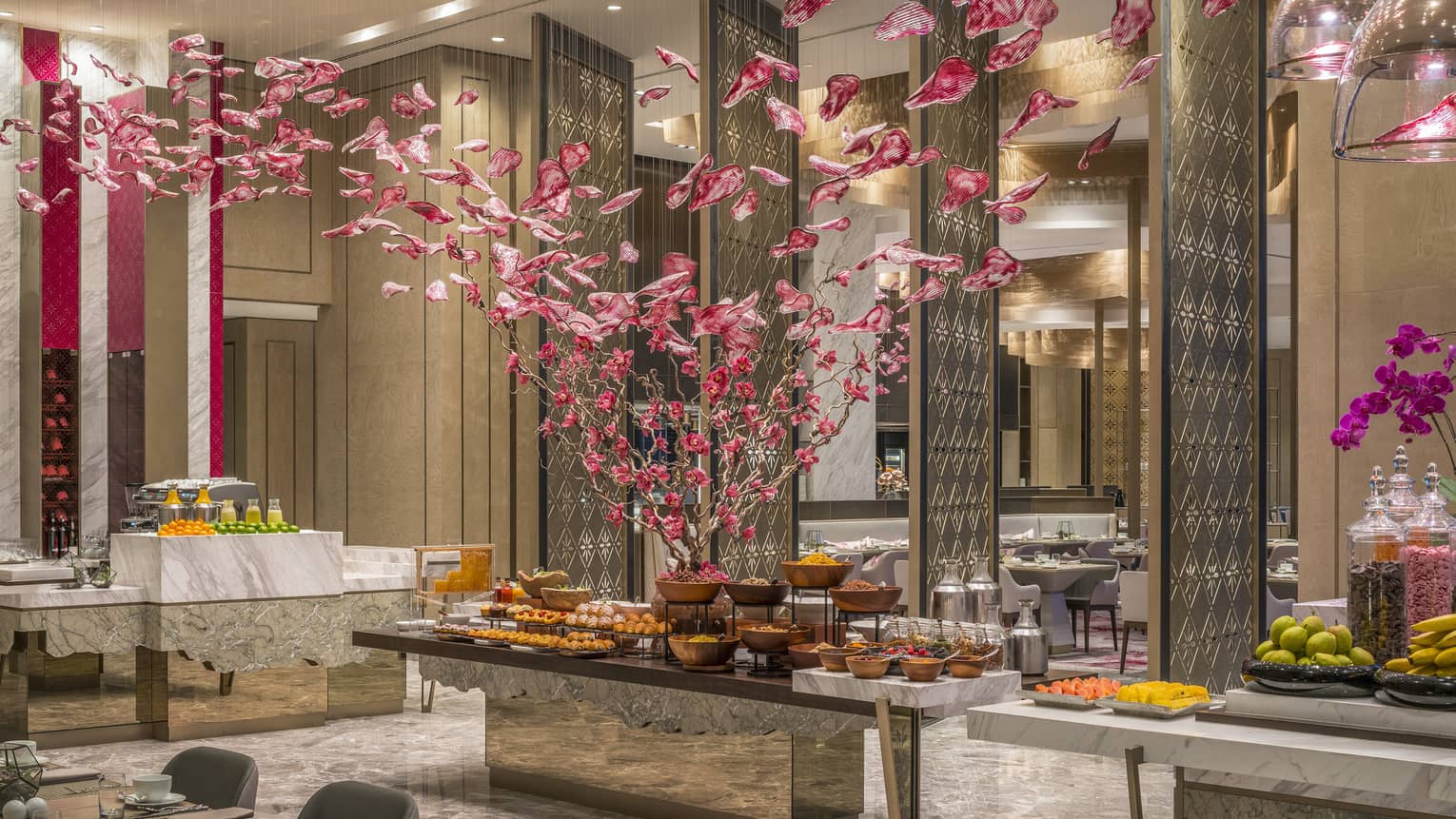 Curate buffet with floral arrangement