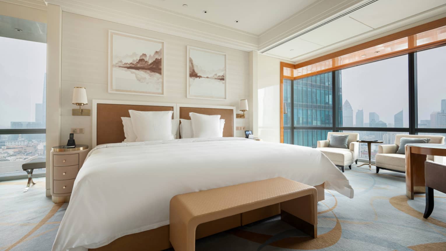 Hotel room with queen bed and city view