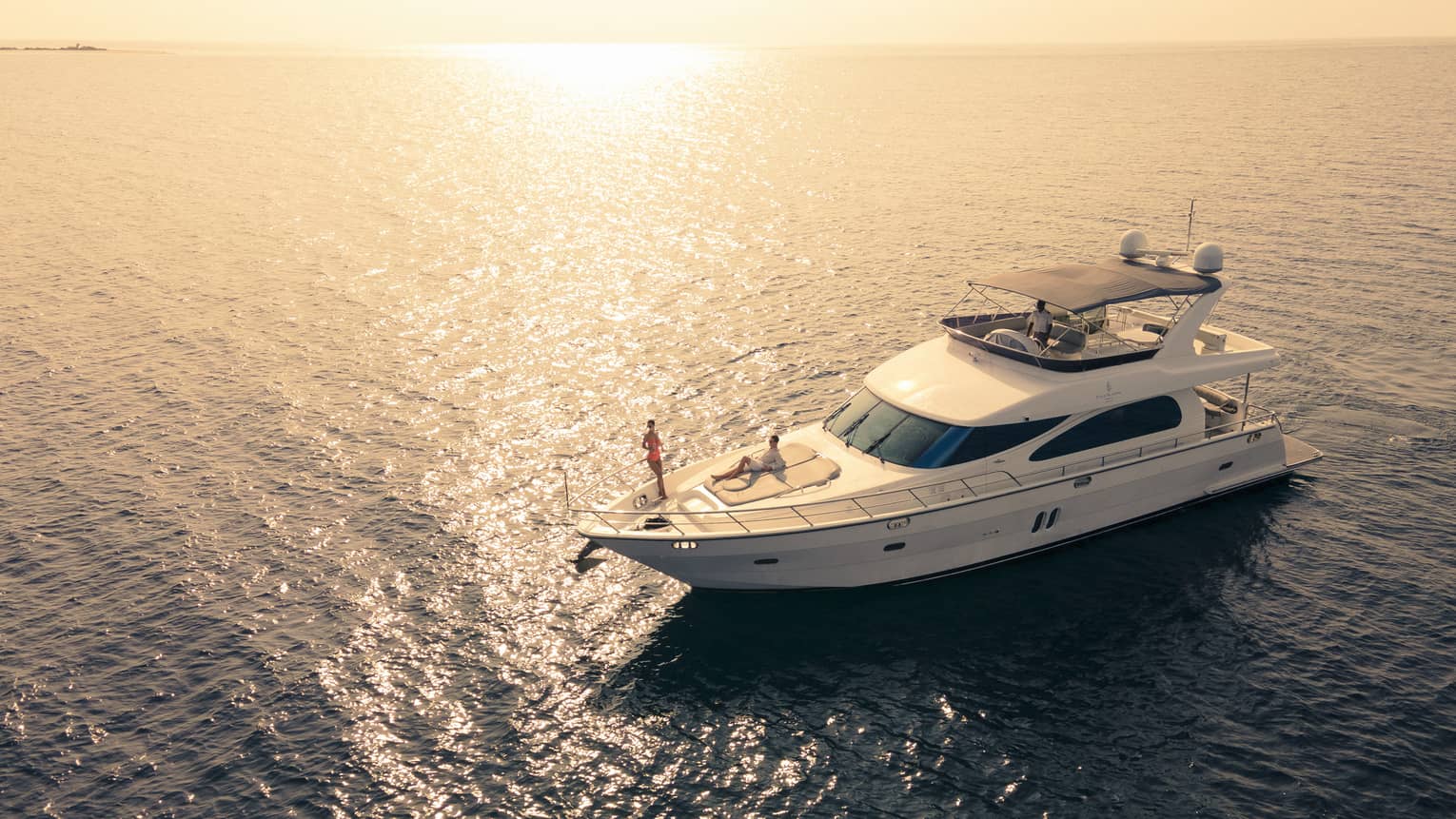 Yacht on the water at sunset