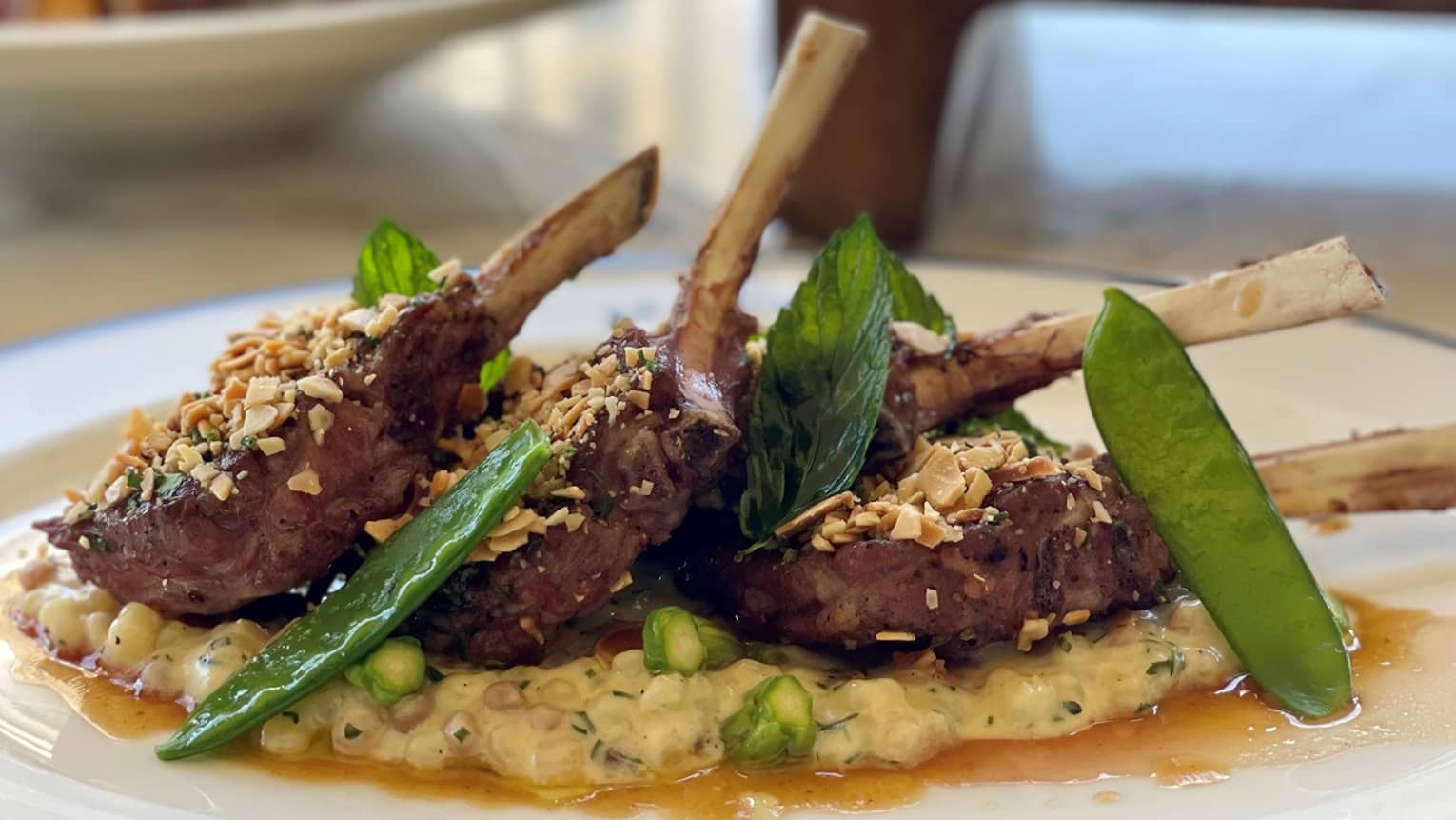 Lamb chops with asparagus and fregola mangetout