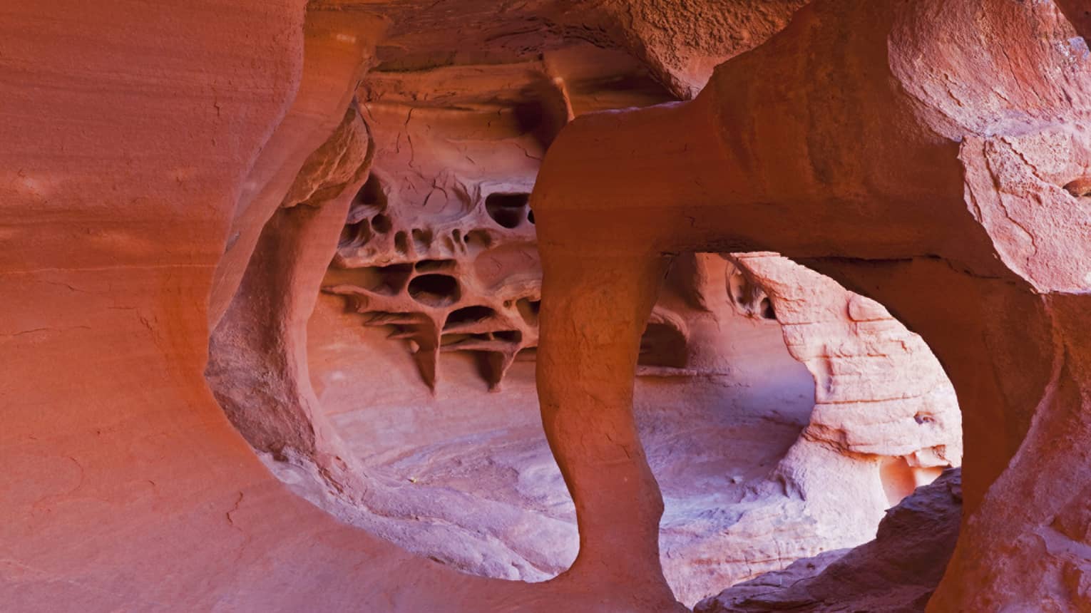 Trail through curved desert rock formations in Grand Canyon