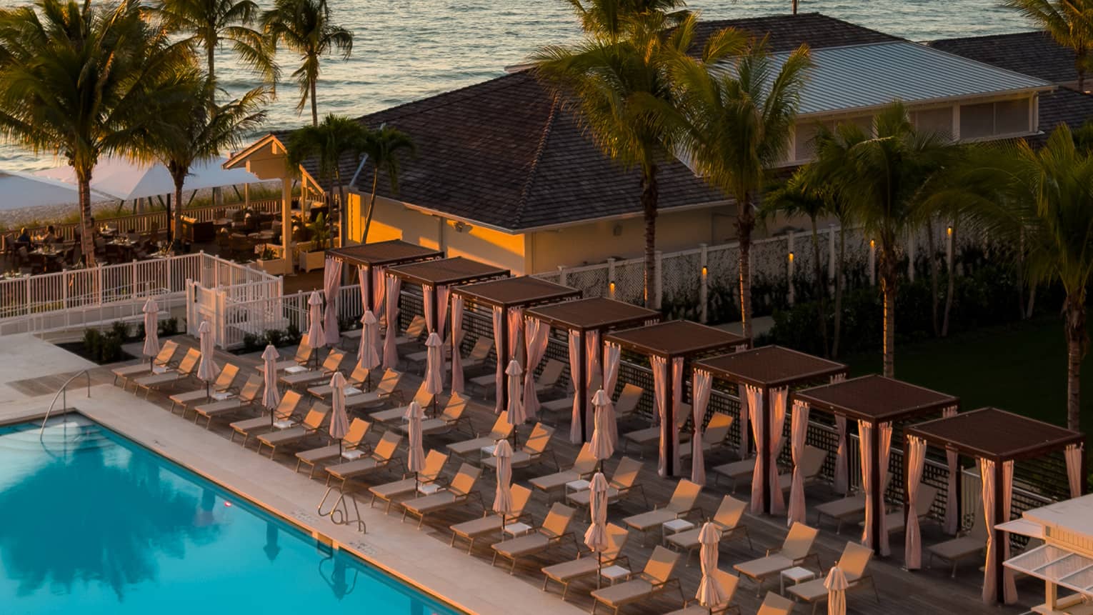 Outdoor pool at sunset