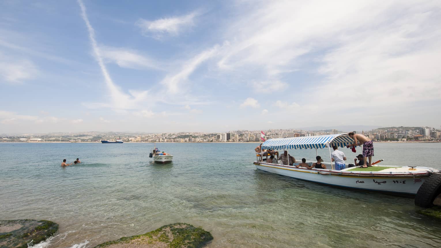 View from shore of boats on water in Saida, South Lebanon on Lebanese coast 