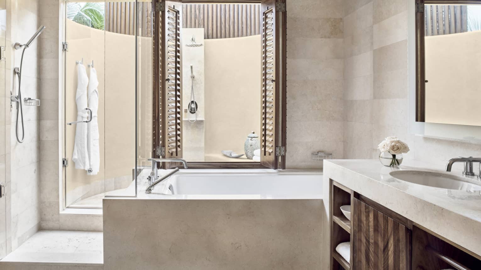 Bathroom with tub, shower and walk-out outdoor shower