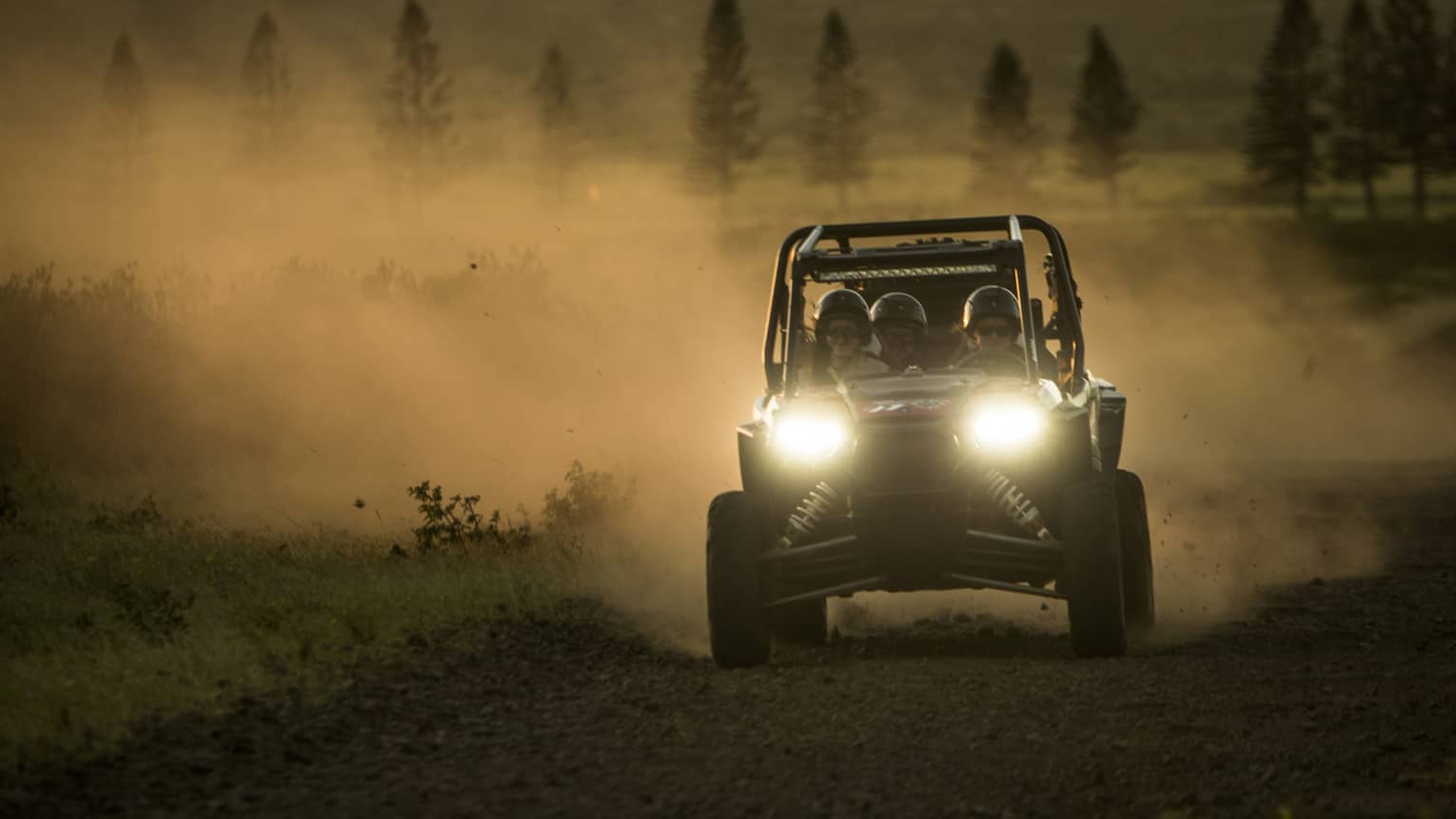UTV rides through a rugged landscape