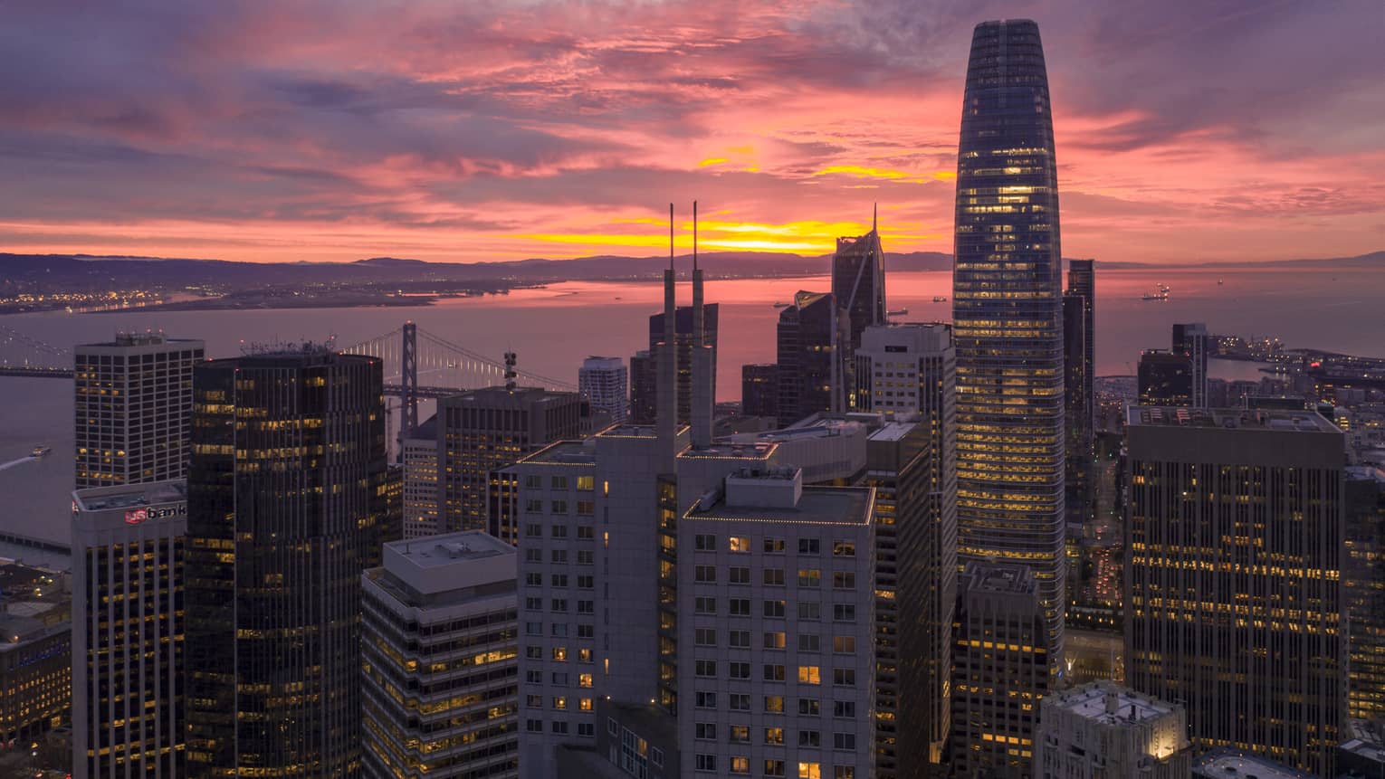 A city skyline during sunset.