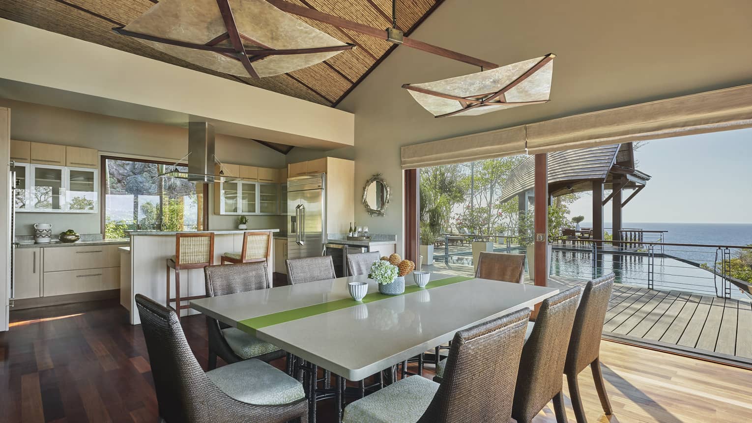La Luna dining table, kitchen and open wall to patio