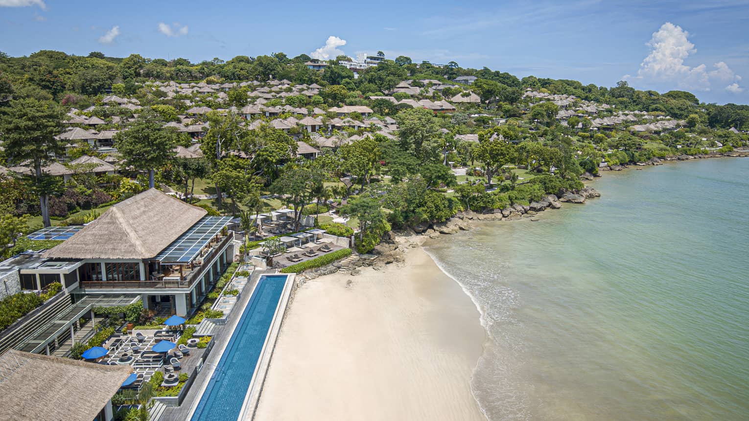 Aerial shot of the Resort, visible shoreline and foliage