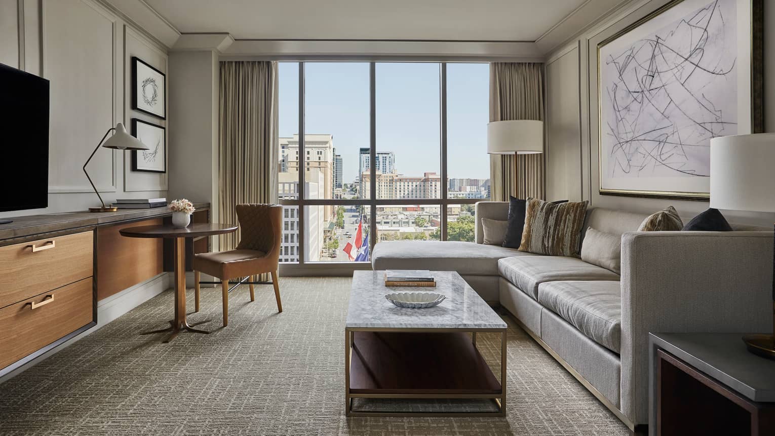 Downtown Austin Hotel Suites Rooms Luxury Four Seasons City View Suite L Shaped Sofa Marble Coffee Table With Books Dresser