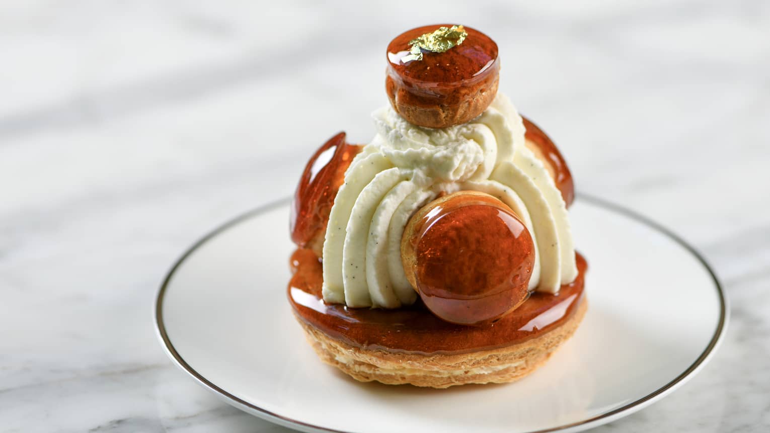 St. Honor� Cake made with golden puff pastry, cream puffs, Chantilly creme and salted caramel