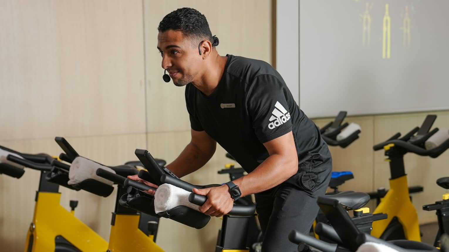 A man on a stationary bike.