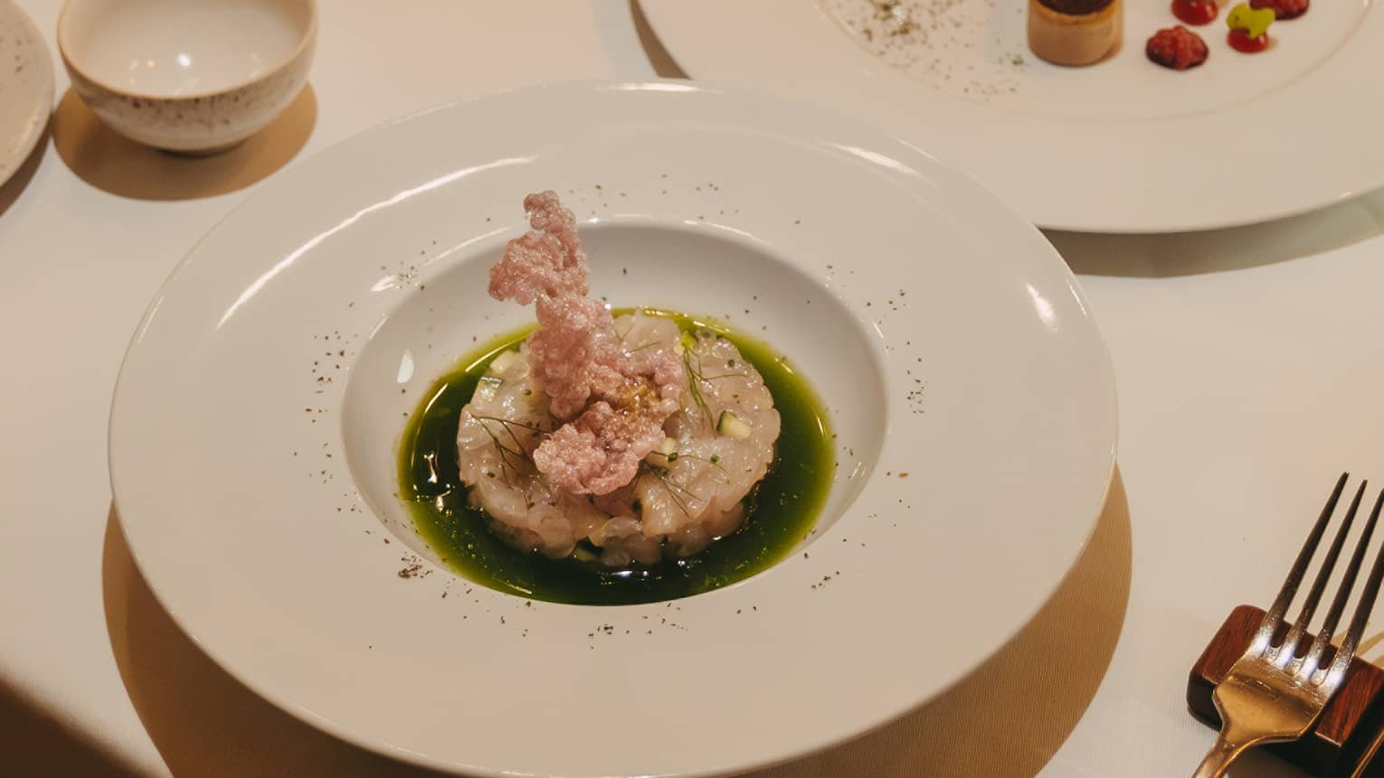 Fine dining featuring a savoury seafood dish