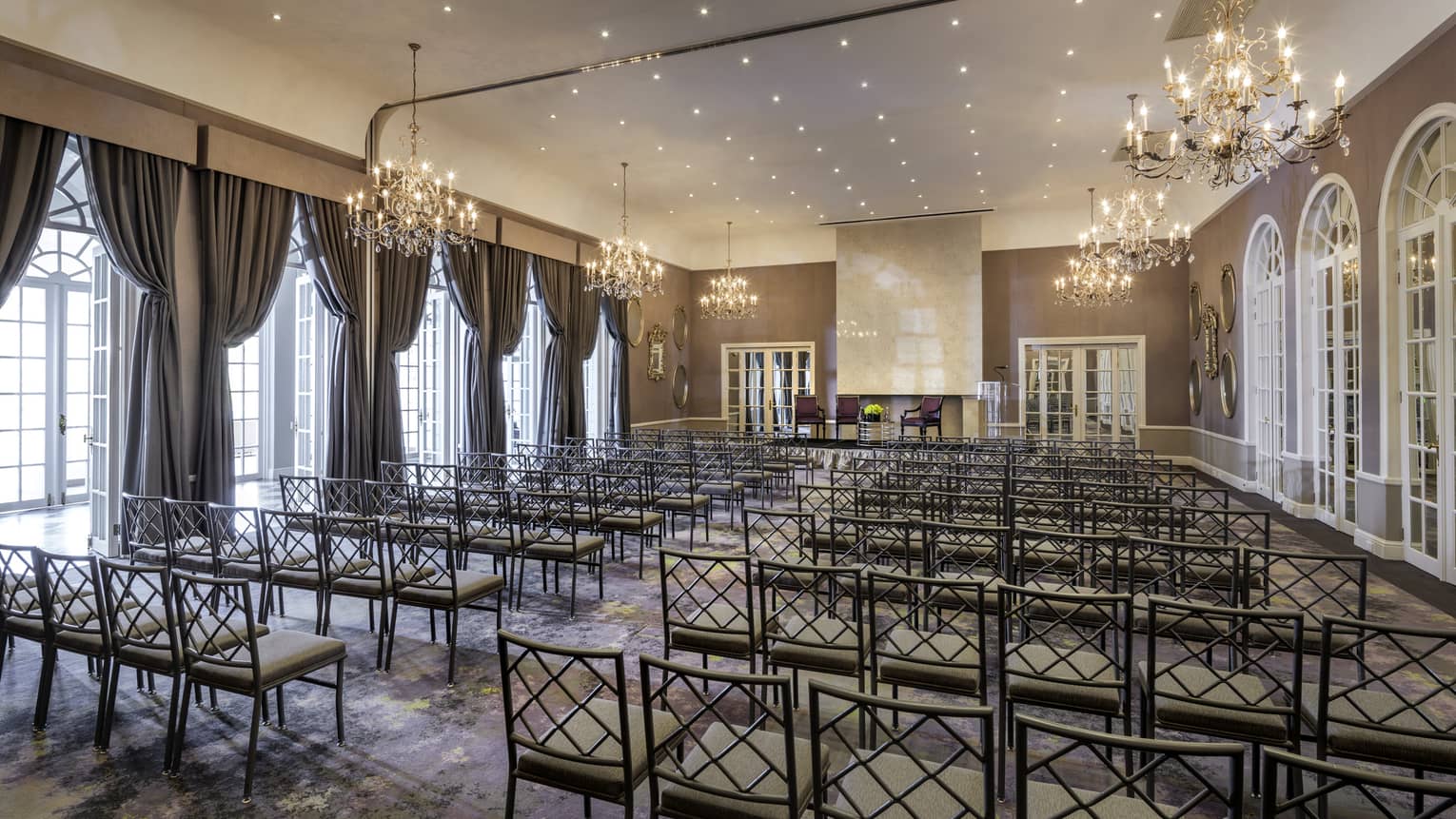 Arcadia Ballroom with rows of chairs facing conference podium