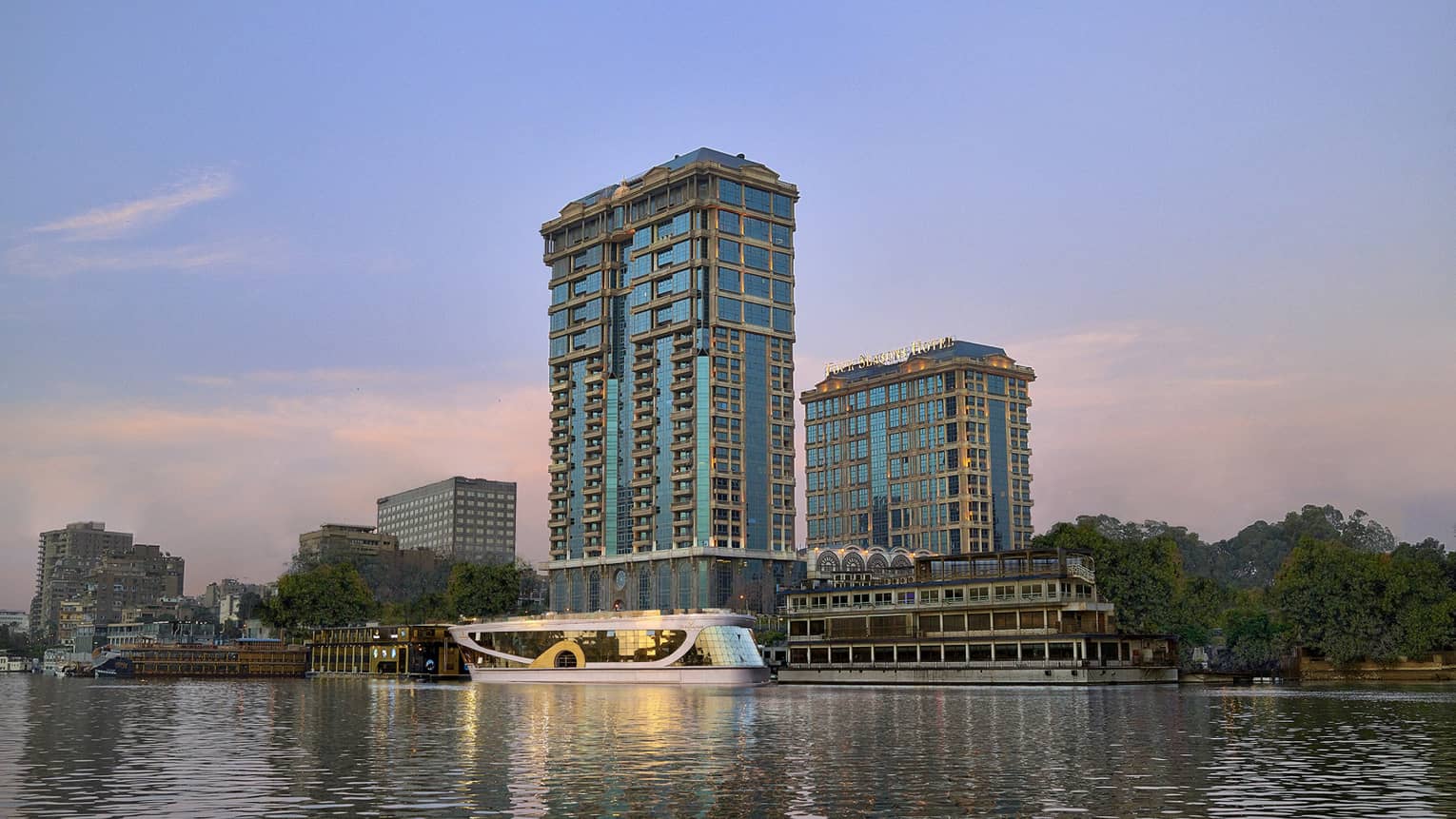 Cairo at the First Residence exterior illuminated at sunset