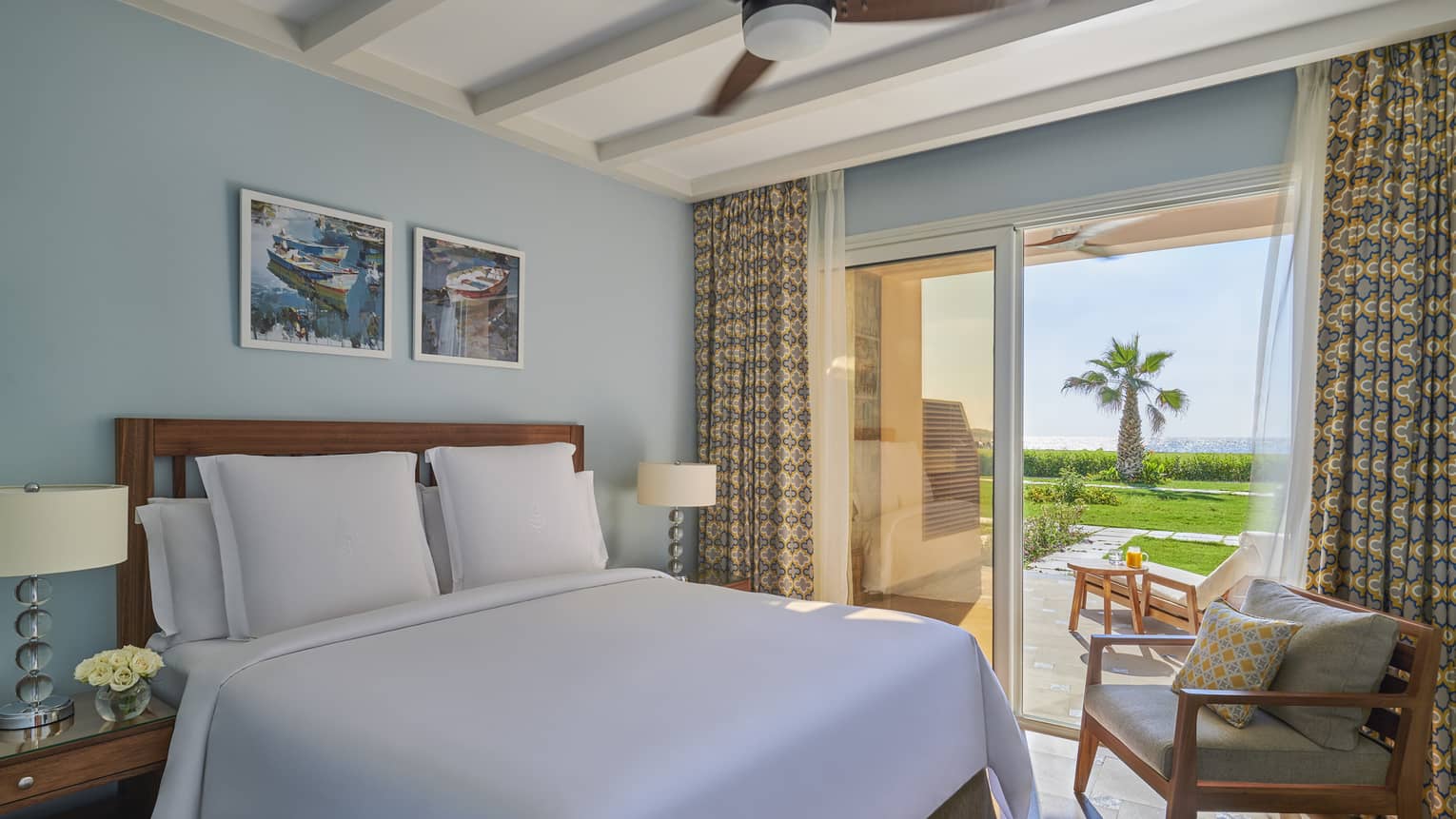 A freshly-made bed in the beach suite overlooking the marsh