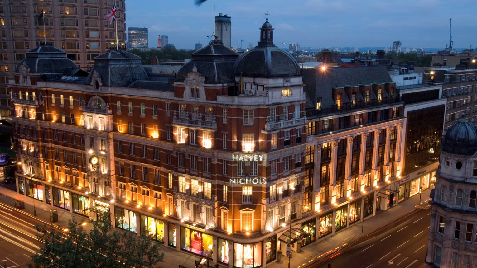 Four Seasons Hotel London at Park Lane illuminated at dusk