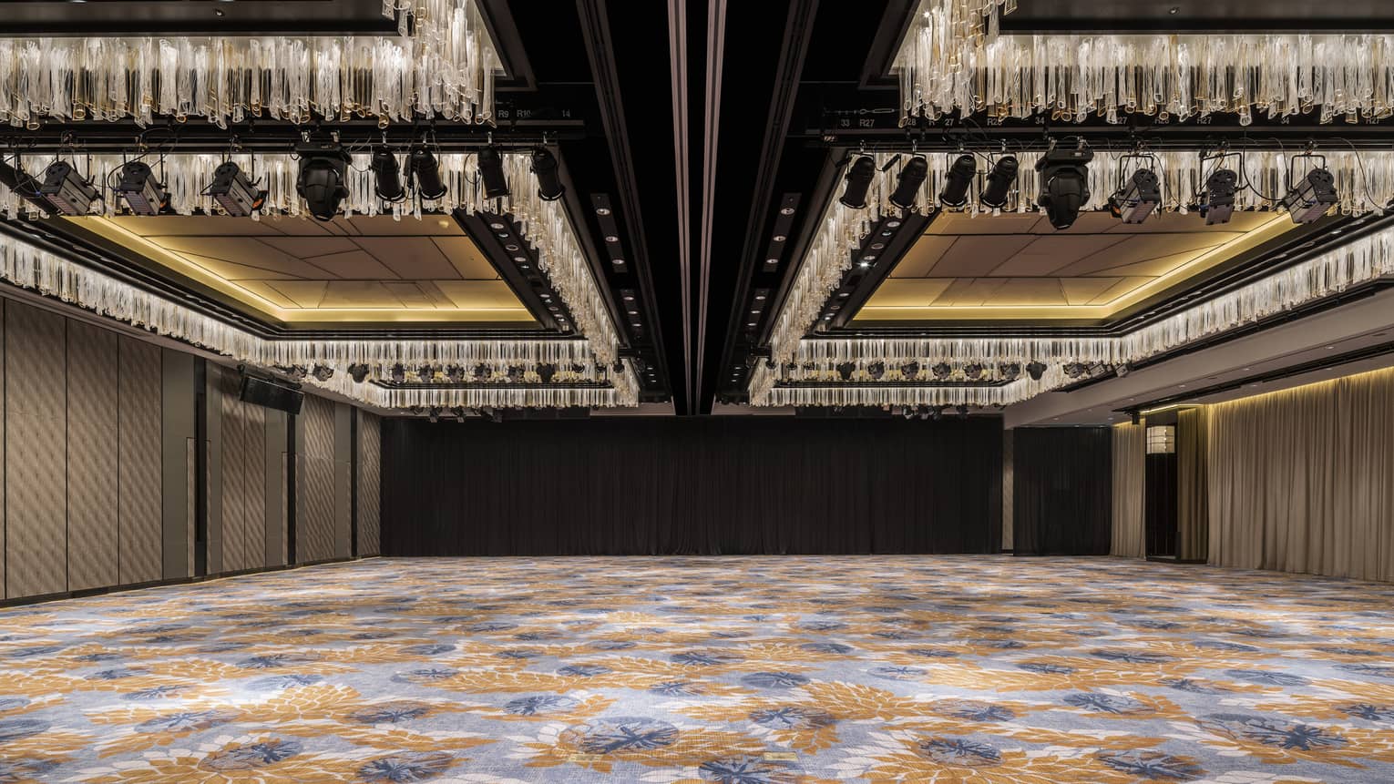 Dazzling chandeliers hang from high ceiling in Grand Ballroom 