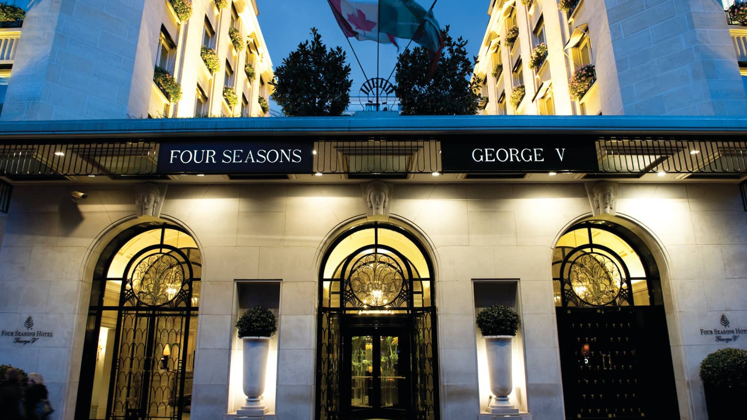 Four Seasons George V entrance with arched glass, iron doors