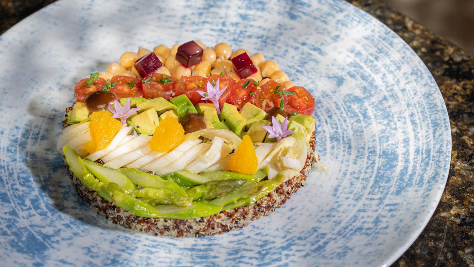 Vegan Cobb Salad with Quinoa, Beetroot, Asparagus, Chickpeas, Orange Sections, Cherry Tomato Halves and Avocado Pieces
