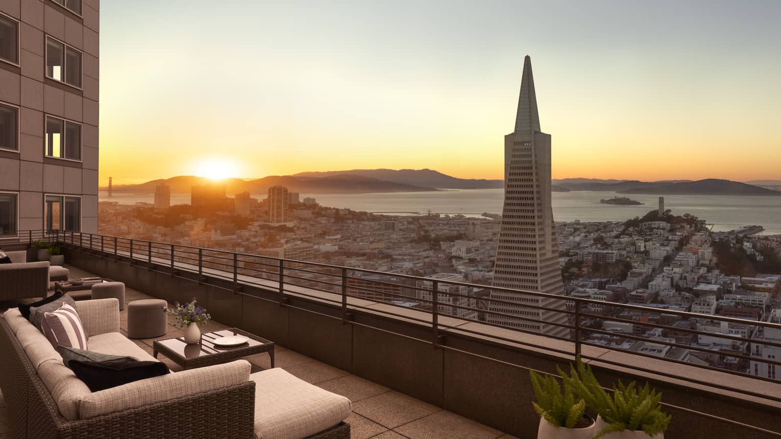 Golden Gate Terrace Suite balcony overlooking San Francisco Bay at sunset