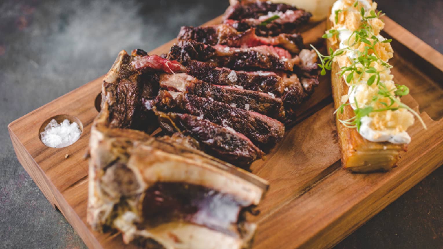Sliced sirloin on a cutting board.