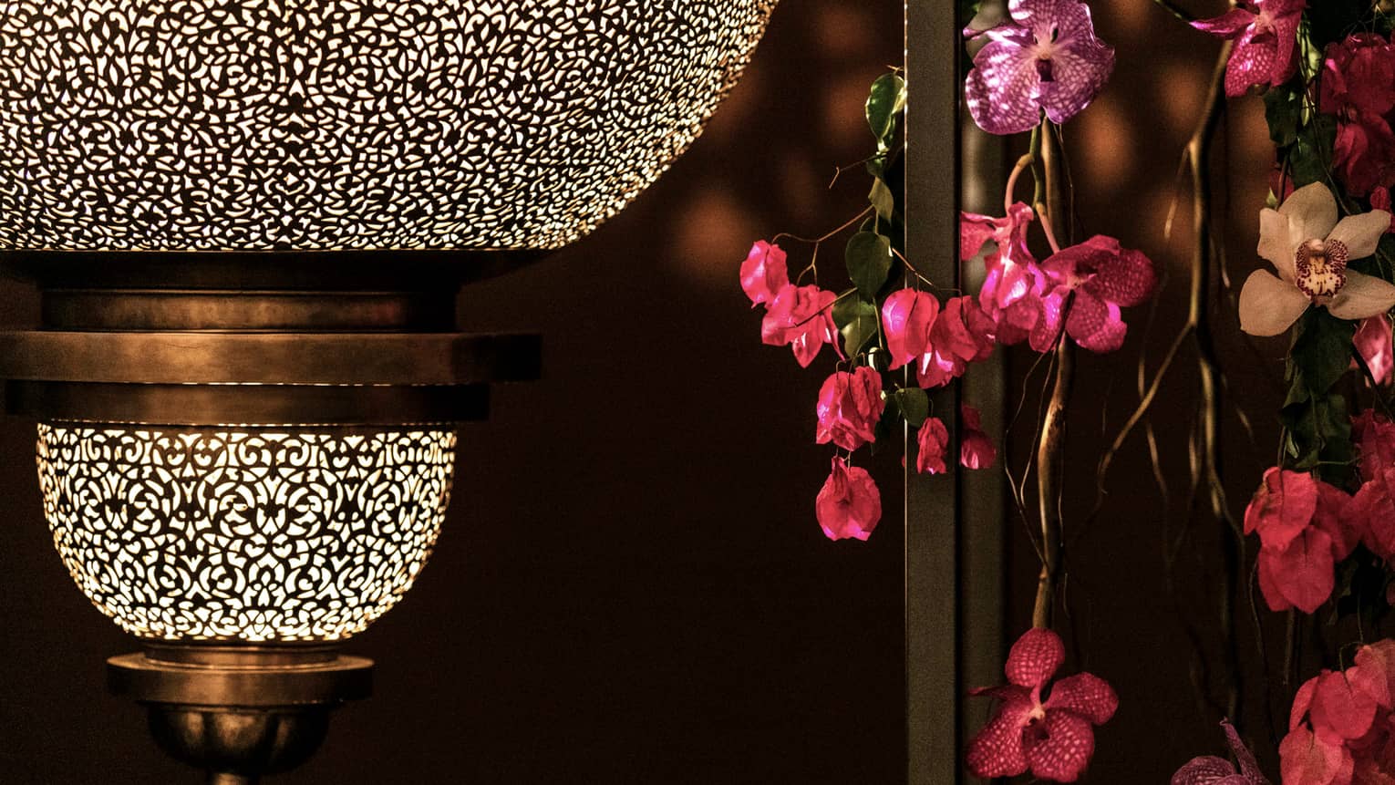 Close-up of Moroccan lantern, pink flowers in Atlantique Ballroom