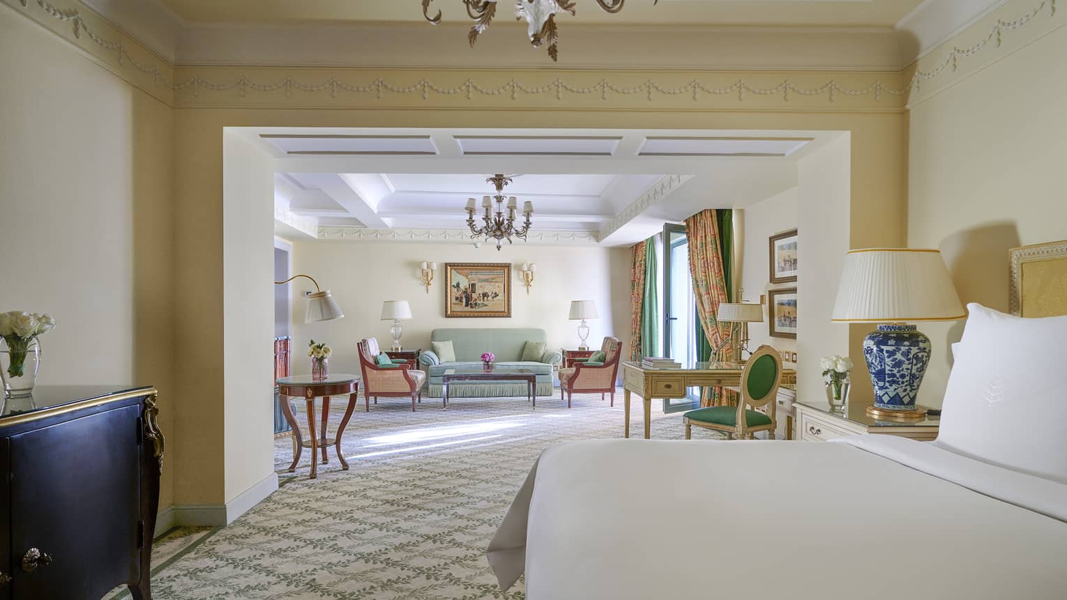 Deluxe Two Bedroom Suite bedroom with living area visible