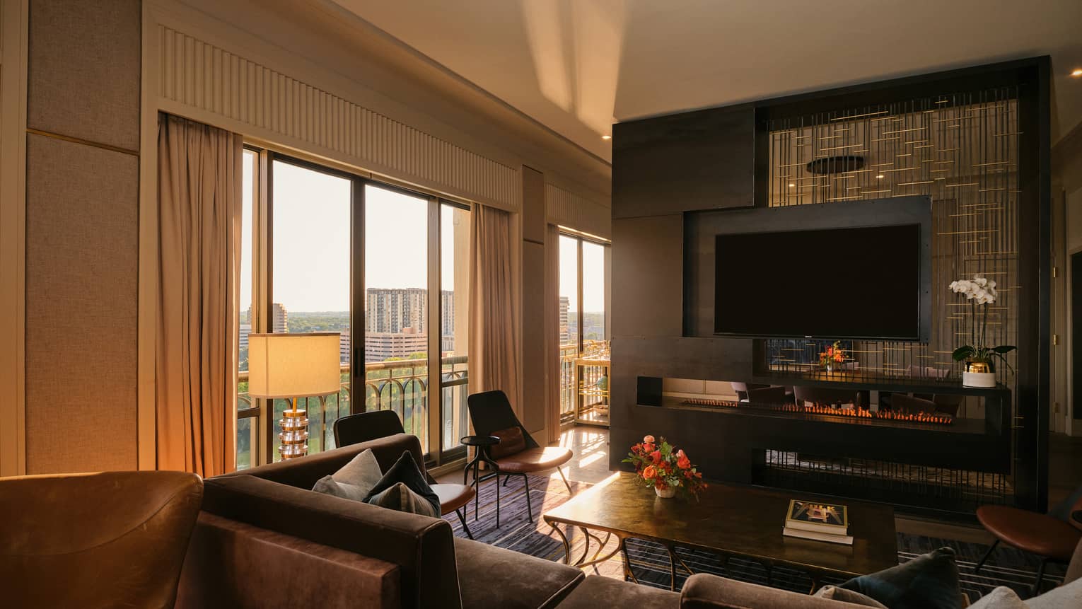 Sun streams into hotel suite living room