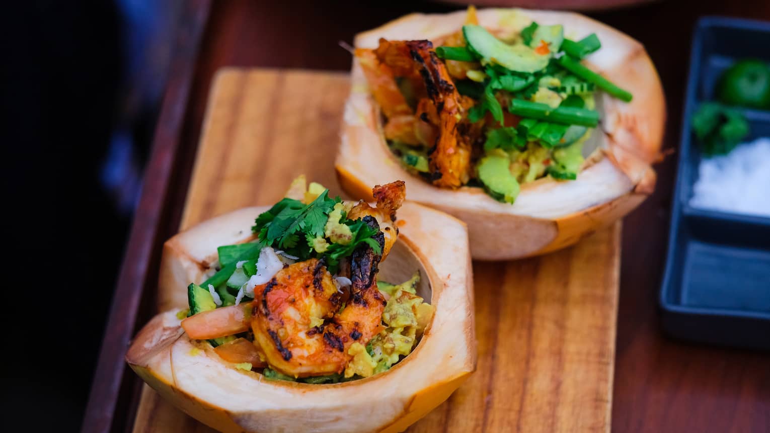 Shrimp dish in a bowl made of a coconut