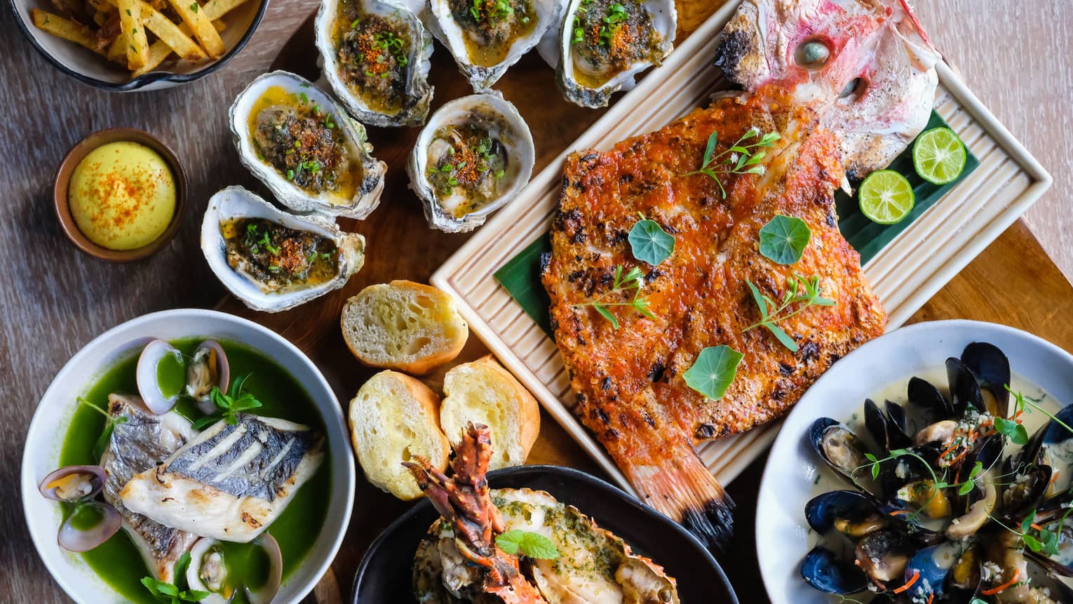 bamboo lobster, tiger prawns, flower crab, Tasmanian salmon, baby snapper, yellowfin tuna, oysters, mussels, clams, squid