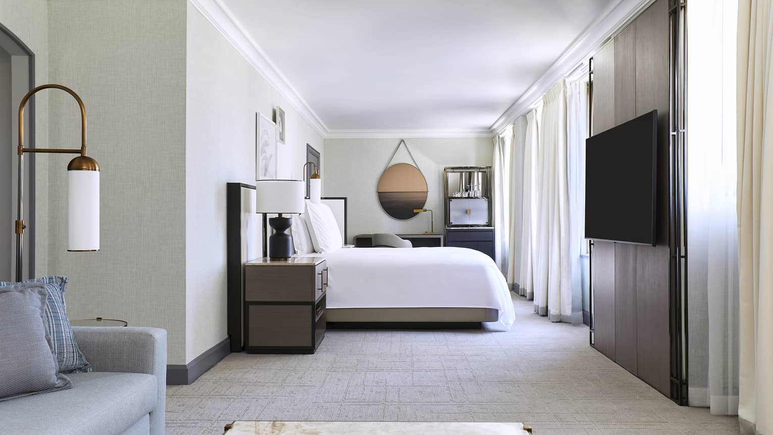 Hotel room with king bed and sitting area