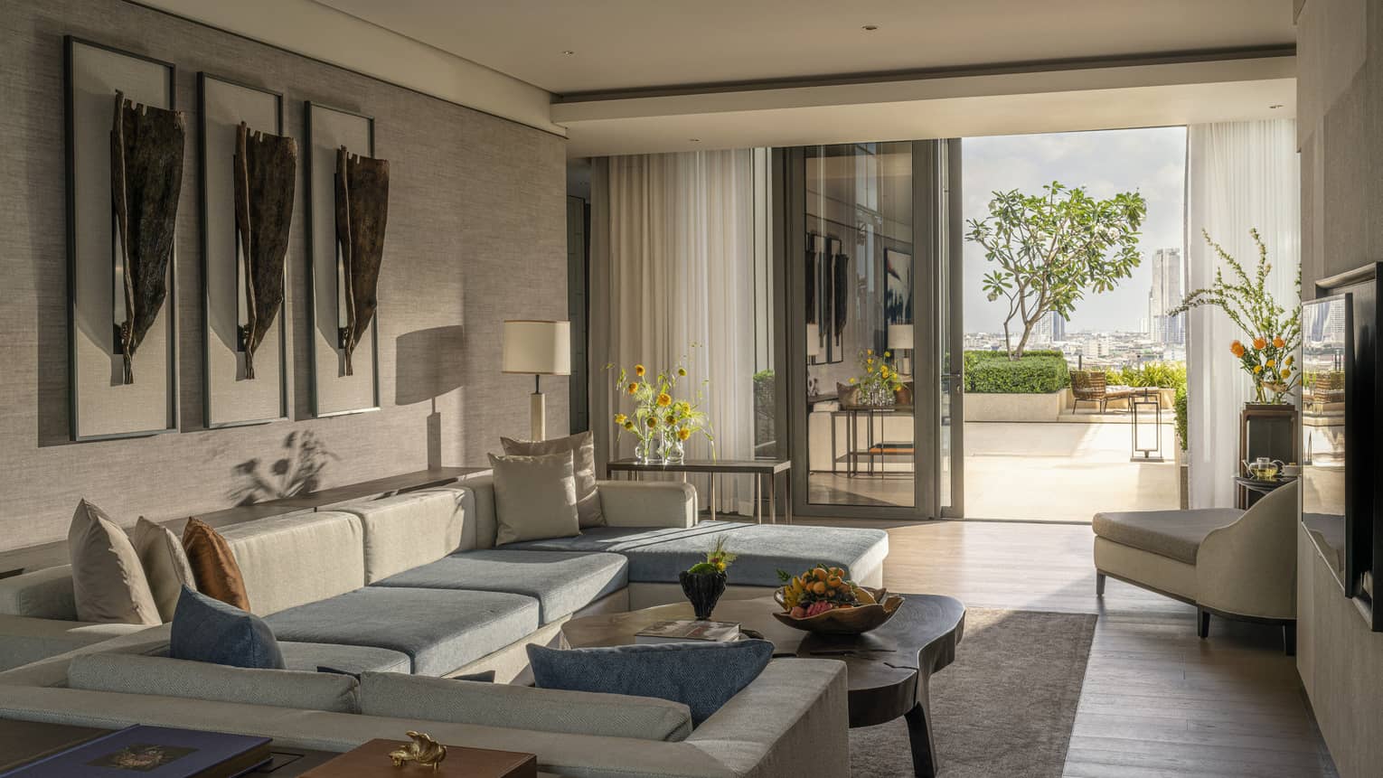 Living room in two-bedroom suite at Four Seasons Hotel Bangkok