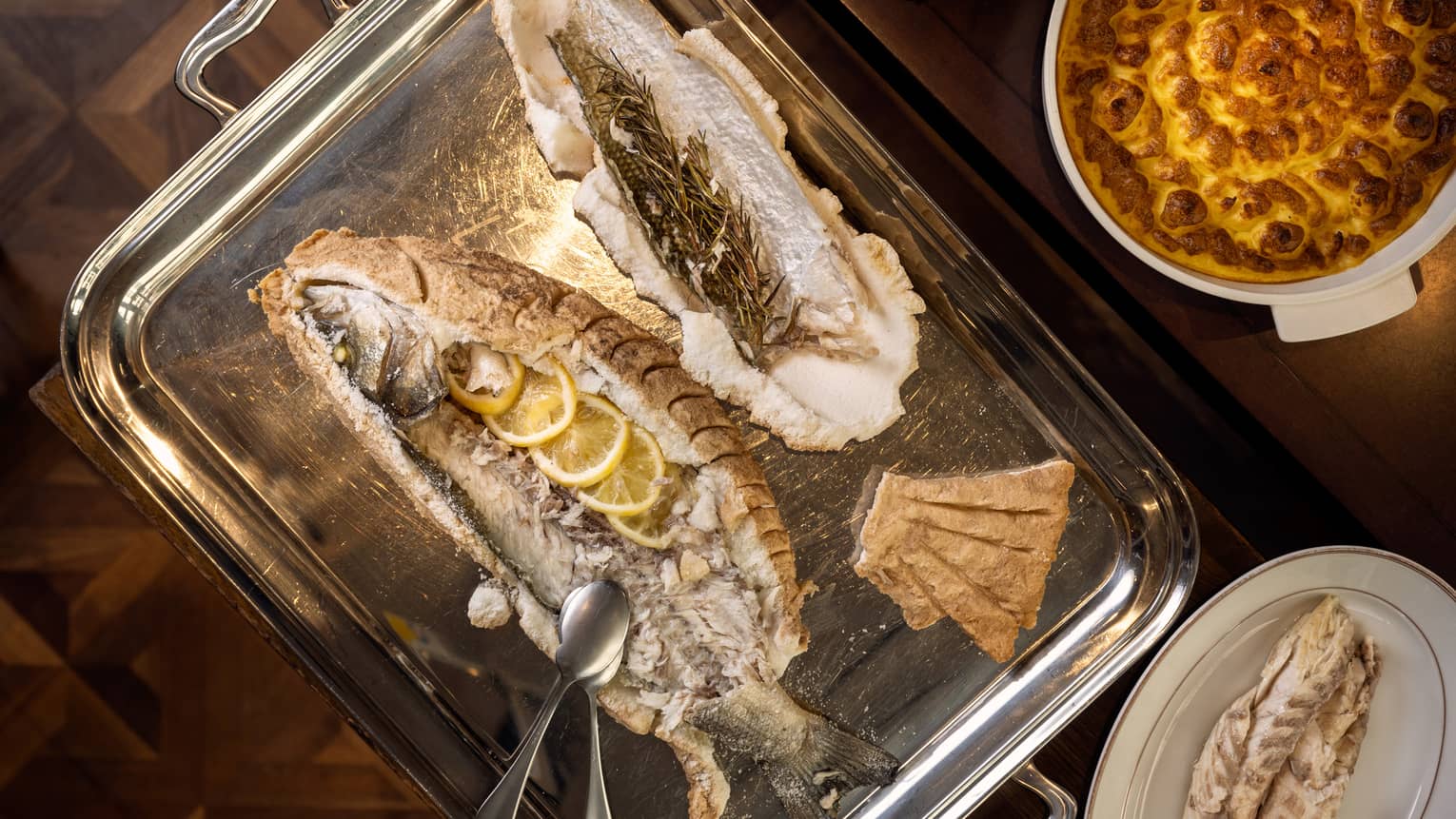 Pan-Roasted Half Fish Topped With a Spray of Lemon Slices